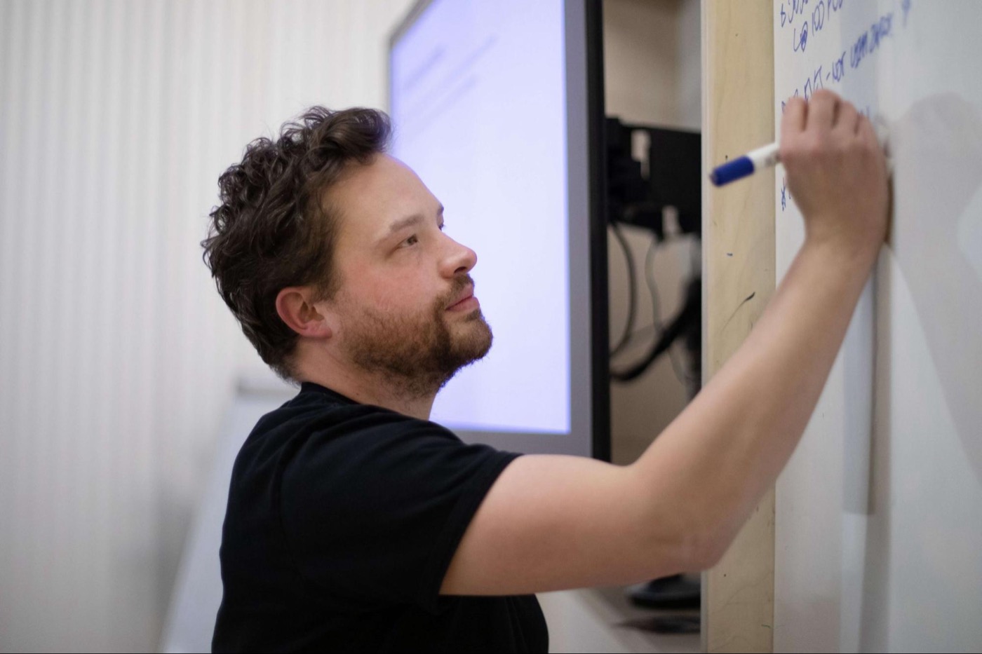David Mather leading a planning session at a whiteboard